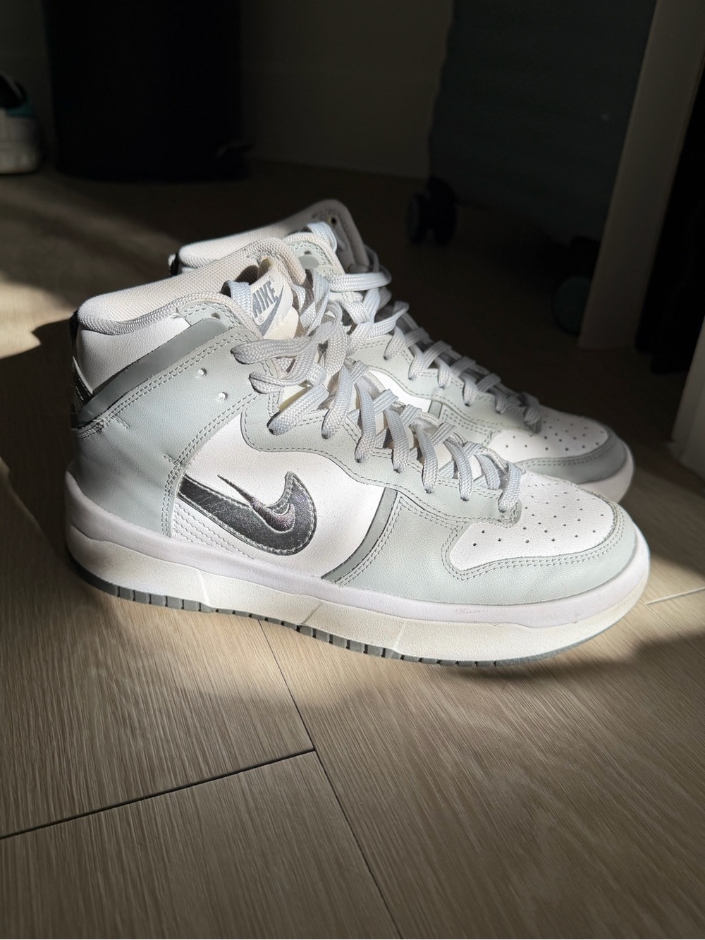 Nike Men’s High-Top Sneakers in White and Silver